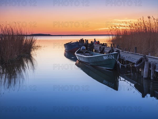 Small fishing harbour on the Peenestrom at sunset