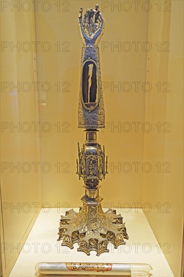 Golden monstrance with forearm bone as relic
