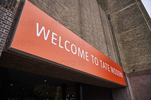 Tate Modern with Welcome to Tate Modern sign