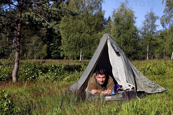 Man in tent