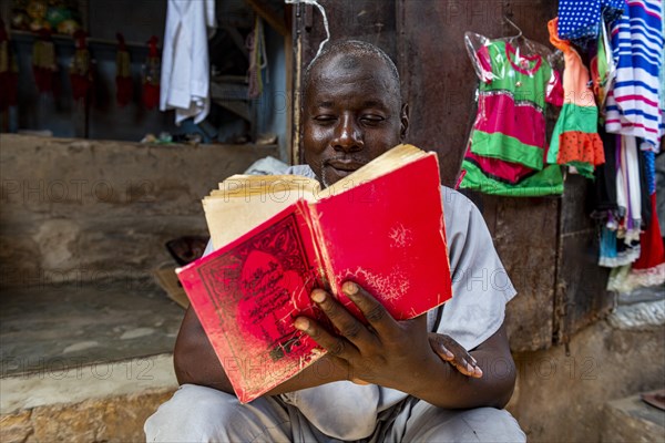 Man reading the Quoran