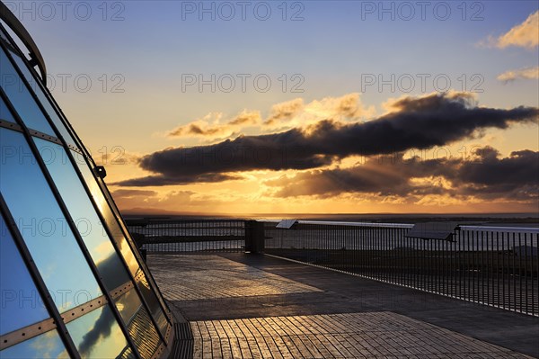 Viewing platform on the Perlan hot water tank at sunset