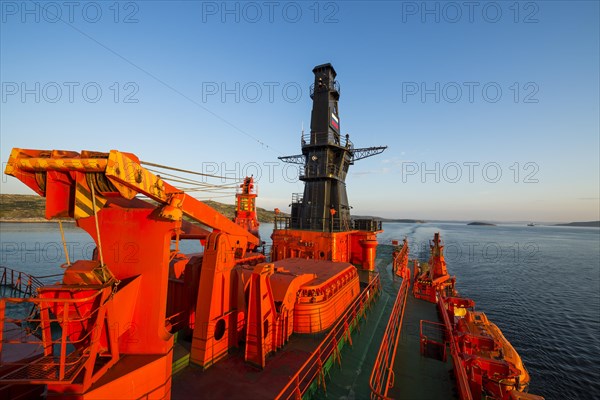 Sunset light on the nuclear icebreaker 50 years of victory