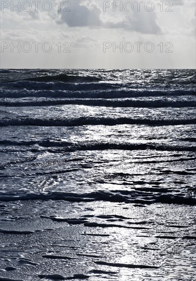 North Sea with outgoing waves in backlight