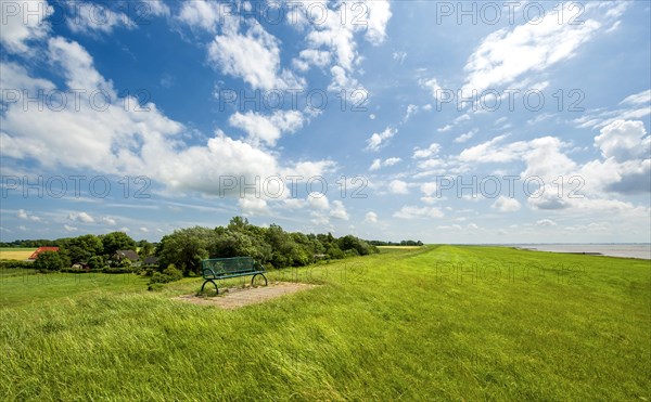 Bench in panoramic position on the dike at the Wurster North Sea coast between Dorum-Neufeld and Wremen