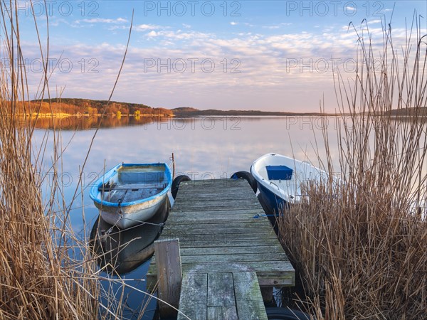 Pier with fishing boats at Schmollensee