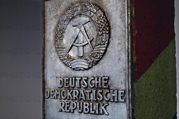 Border post with national coat of arms of the GDR