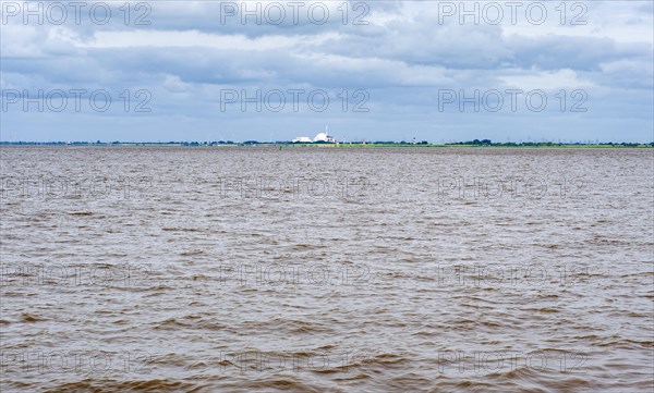 In the back Brokdorf nuclear power plant at the river Elbe