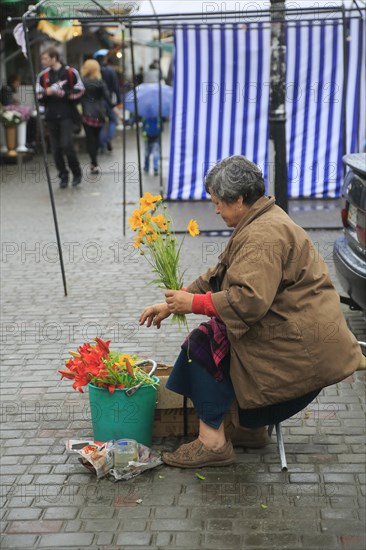 Flower seller in front of Privoz food market