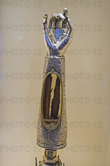 Golden monstrance with forearm bone as relic