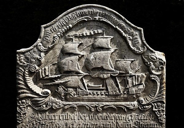 Speaking gravestone of Nickels Nahmens with a merchant frigate