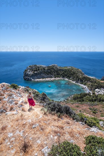 Young woman in red skirt