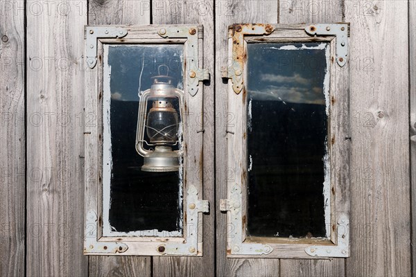 Window and oil lamp