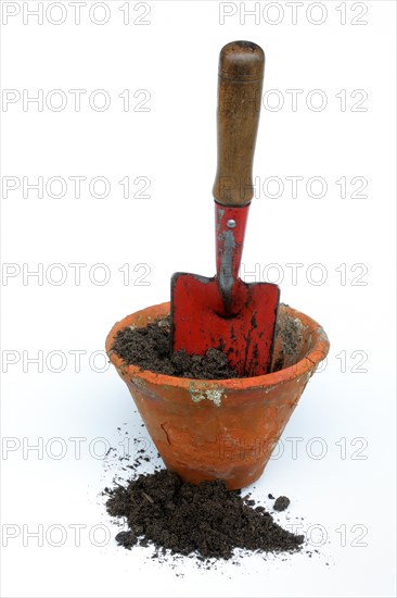 Clay pots and garden shovel