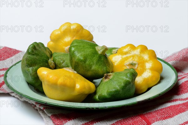 Patisson pumpkins on plate