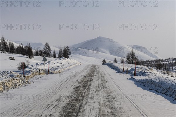Snow covered mountains along the Road of Bones