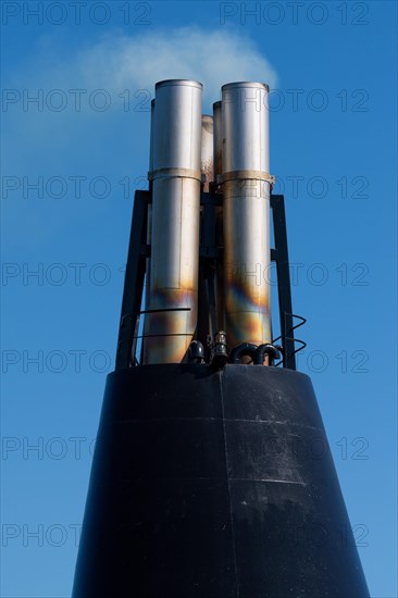 Smoking chimneys of the ferry Norroena