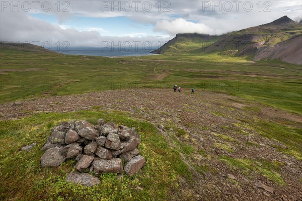 Hikers on their way to Breioavik Bay