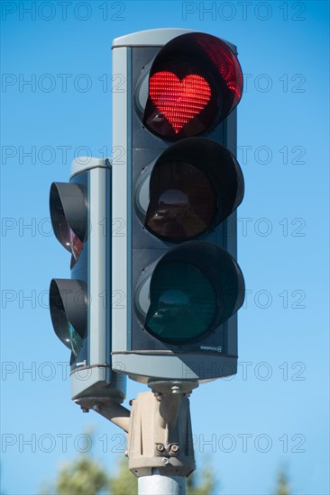 Traffic light with red heart