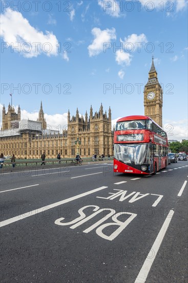 Red double-decker bus on the Westminster Bridge