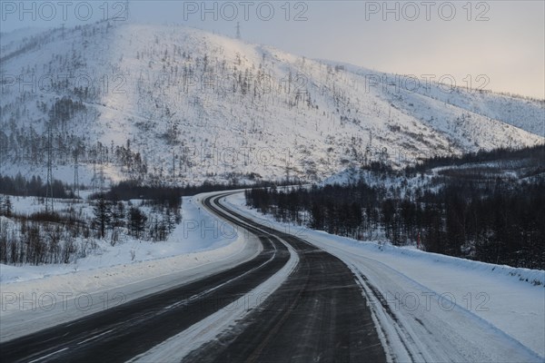 Snow covered mountains along the Road of Bones