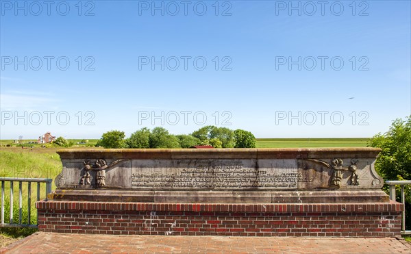 Base of the old siet gate with historical inscription