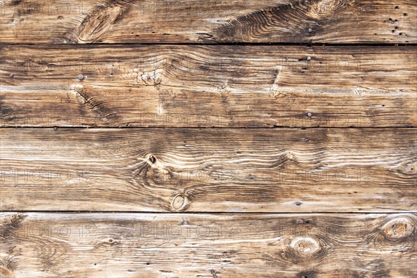 A wall of the old boards. Detail. Mennonites church in village of Palczewo