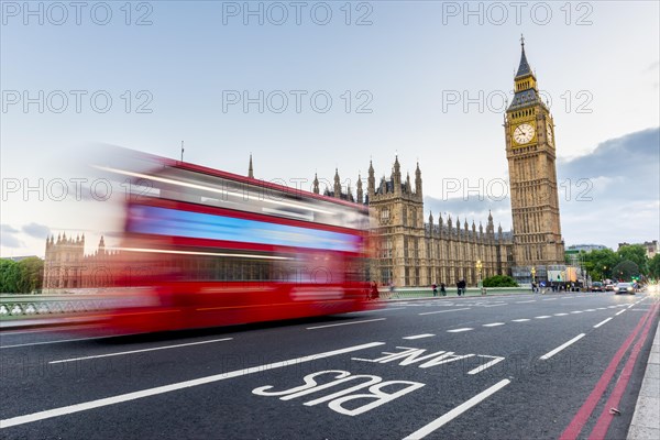 Red double-decker bus on the Westminster Bridge