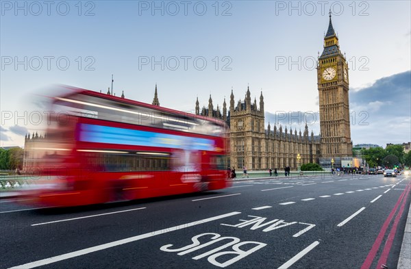 Red double-decker bus on the Westminster Bridge