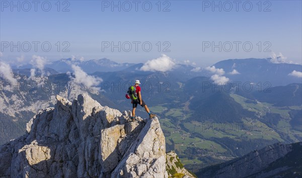 Hiker on a summit on the way to the Hochkalter