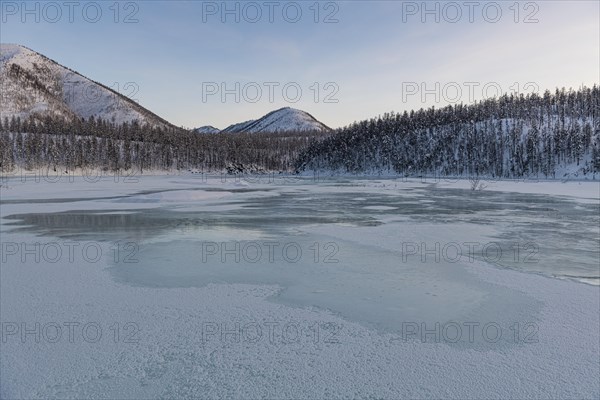 Open water on a frozen lake