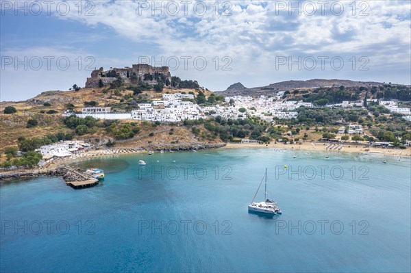 Sailboat on turquoise sea