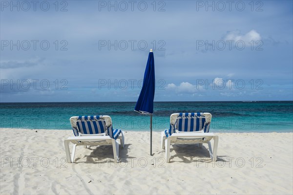 Sun loungers on world class Shoal Bay East beach