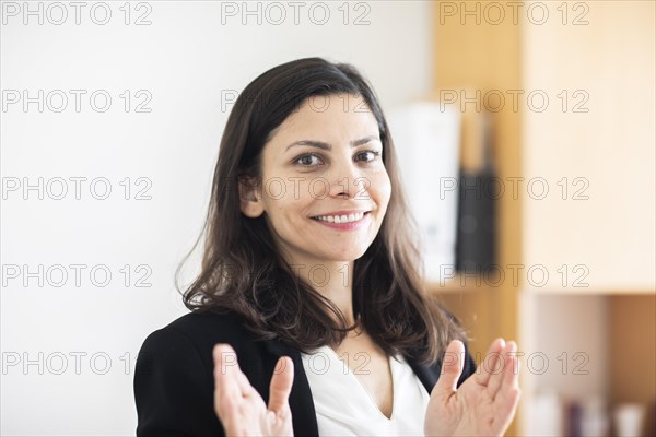 Middle aged serious manager working in an office