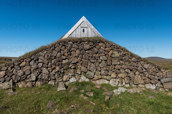 Lonely hut with stone wall