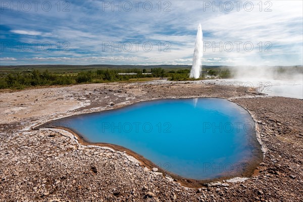 Thermal spring Blesi and eruption Geysir Strokkur