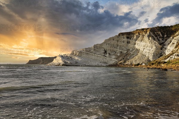 Sunset on rocky coast