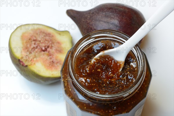 Fig jam in glass and figs