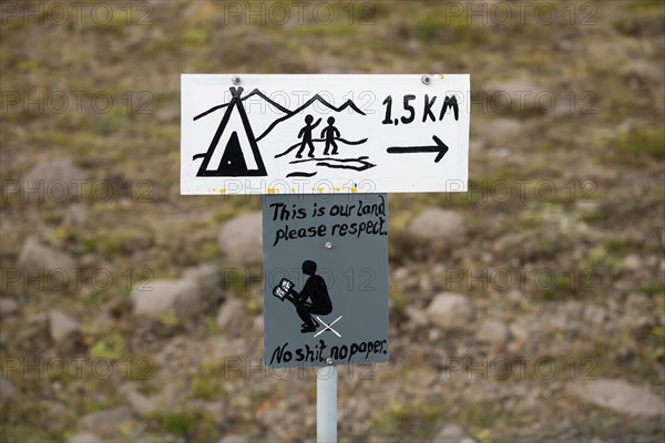 Hand-painted signs Camping and This is our land