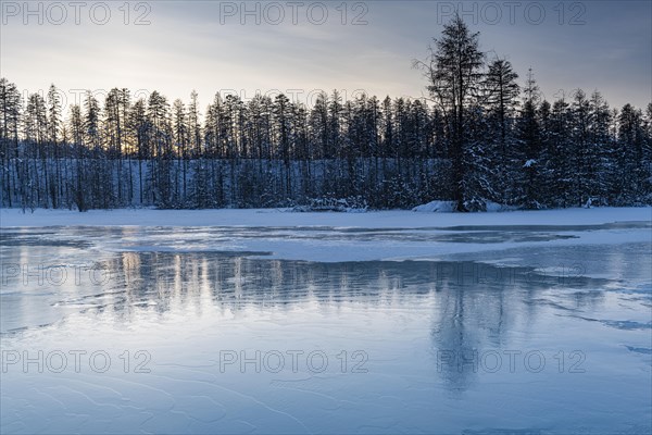 Open water on a frozen lake