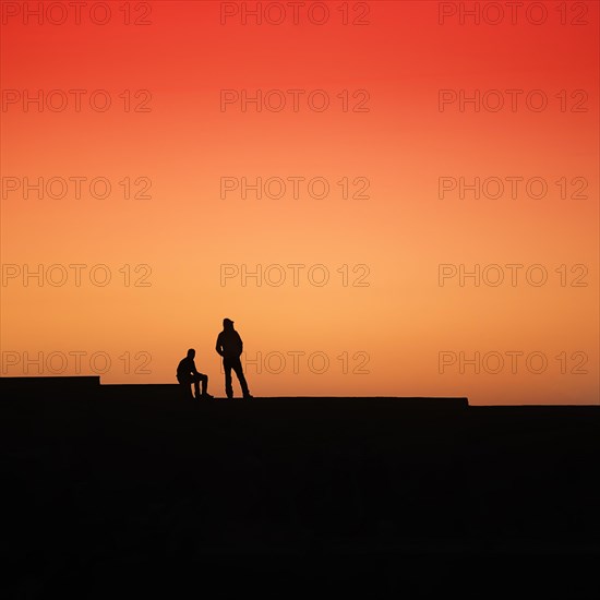 Two men looking into the distance