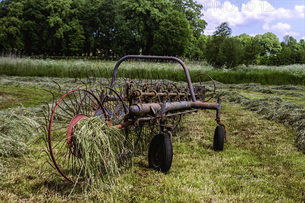 An old hay tedder