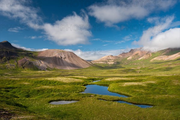 Lake and coloured rhyolite mountains