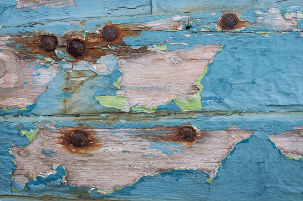 Rusty nails and peeling paint