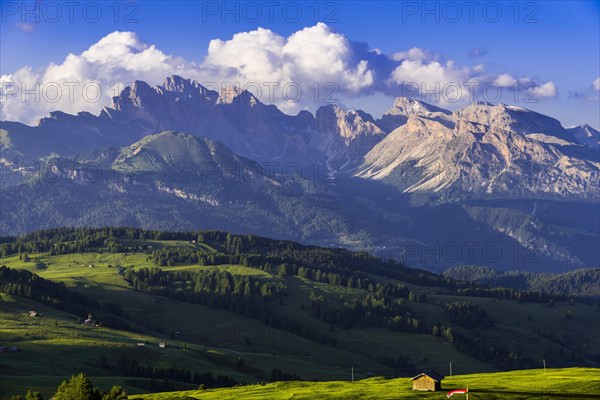 View over the Alpe di Siusi (foreground) to the peaks of the Geisler Group and the Cisles Valley