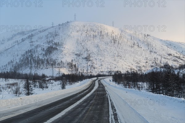 Snow covered mountains along the Road of Bones