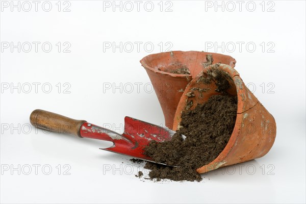 Clay pots and garden shovel