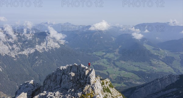 Hiker on a summit on the way to the Hochkalter