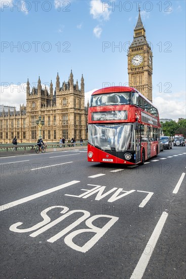 Red double-decker bus on the Westminster Bridge