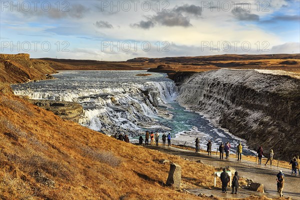 Visitors at the waterfall